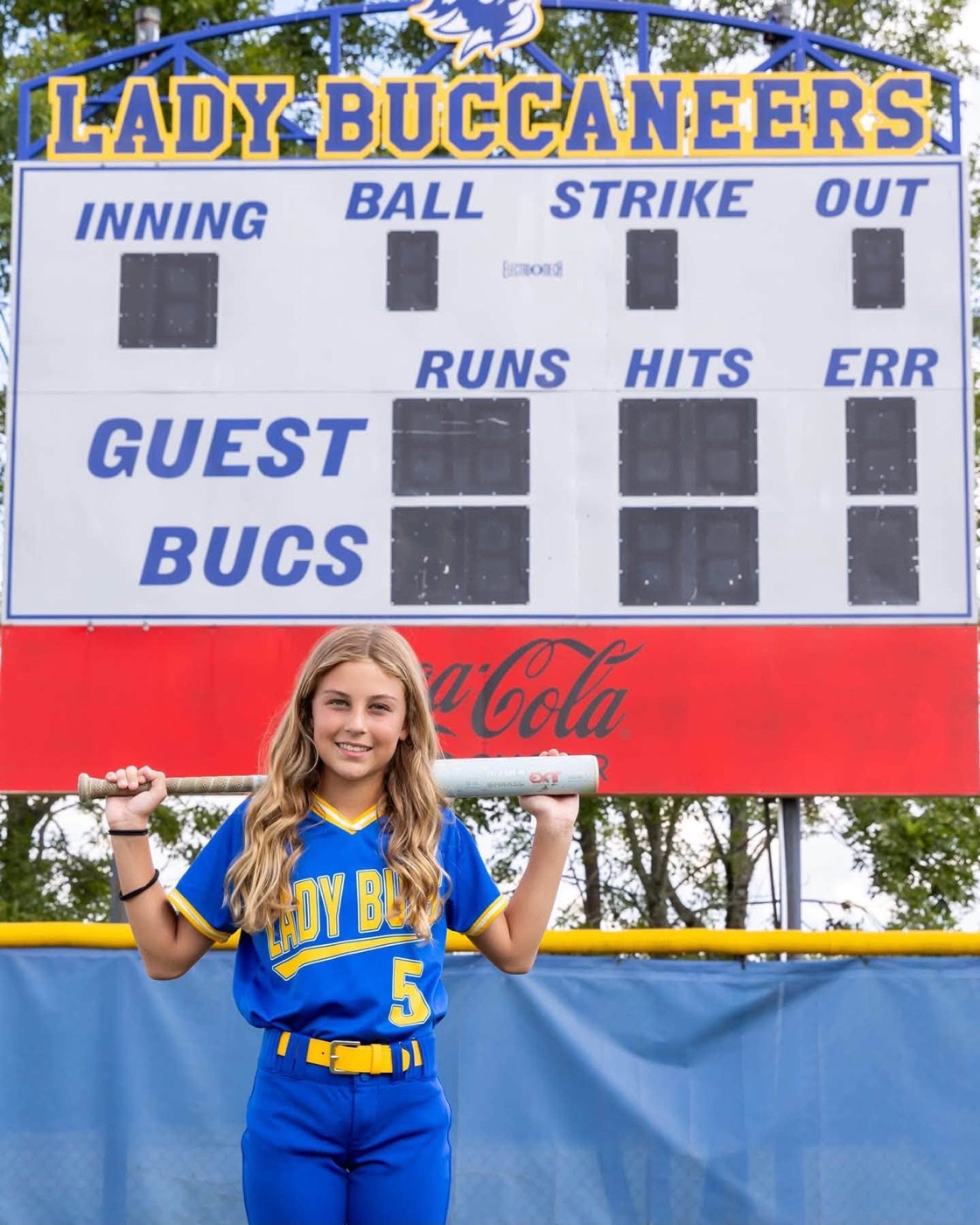Lila Gandy playing softball